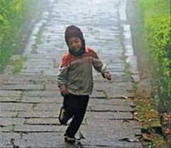 verb: boy walking in the morning